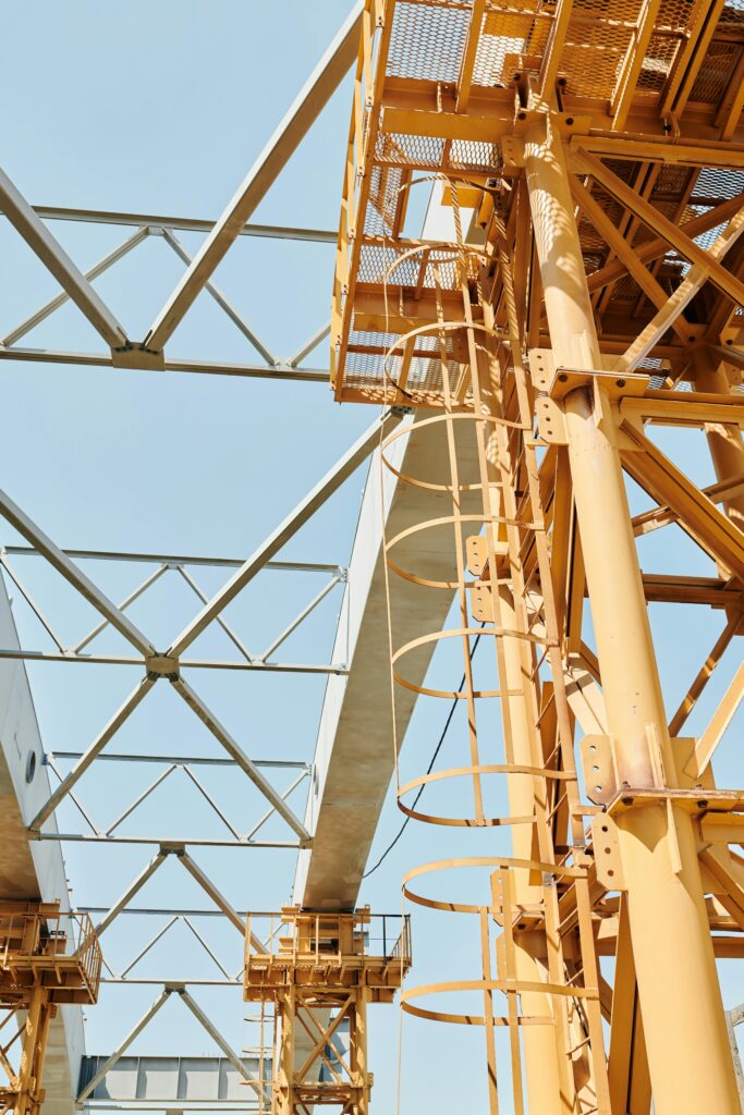 Low Angle shot of a Metal Construction under Clear Blue Sky